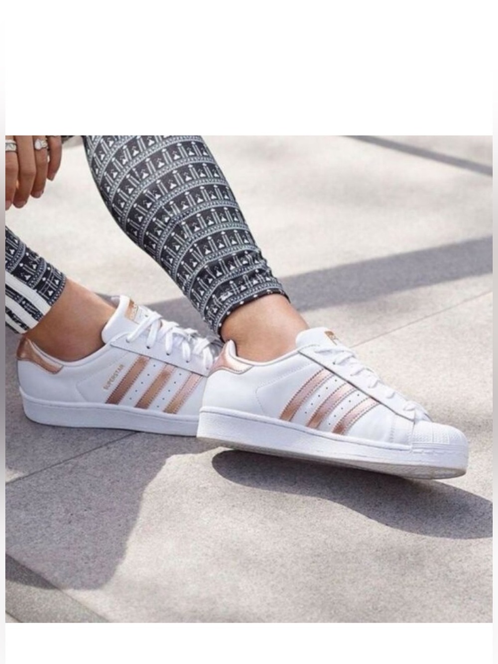 White and rose gold Adidas Superstars